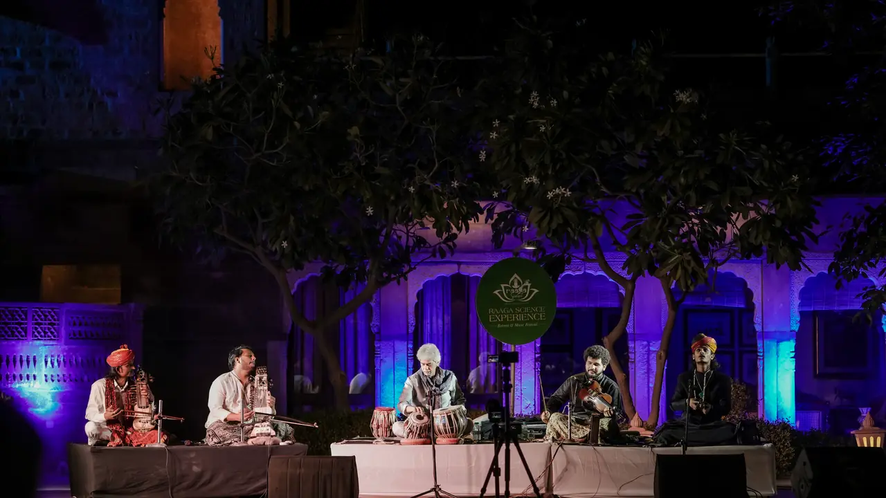 Vocalist performing with the ensemble at night
