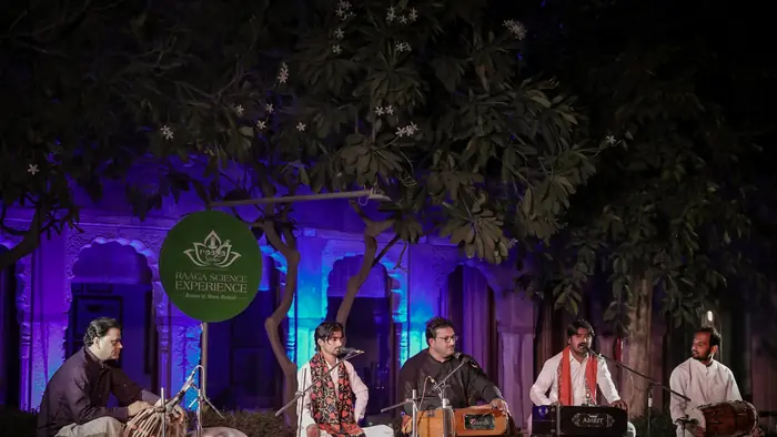 The ensemble performing on stage